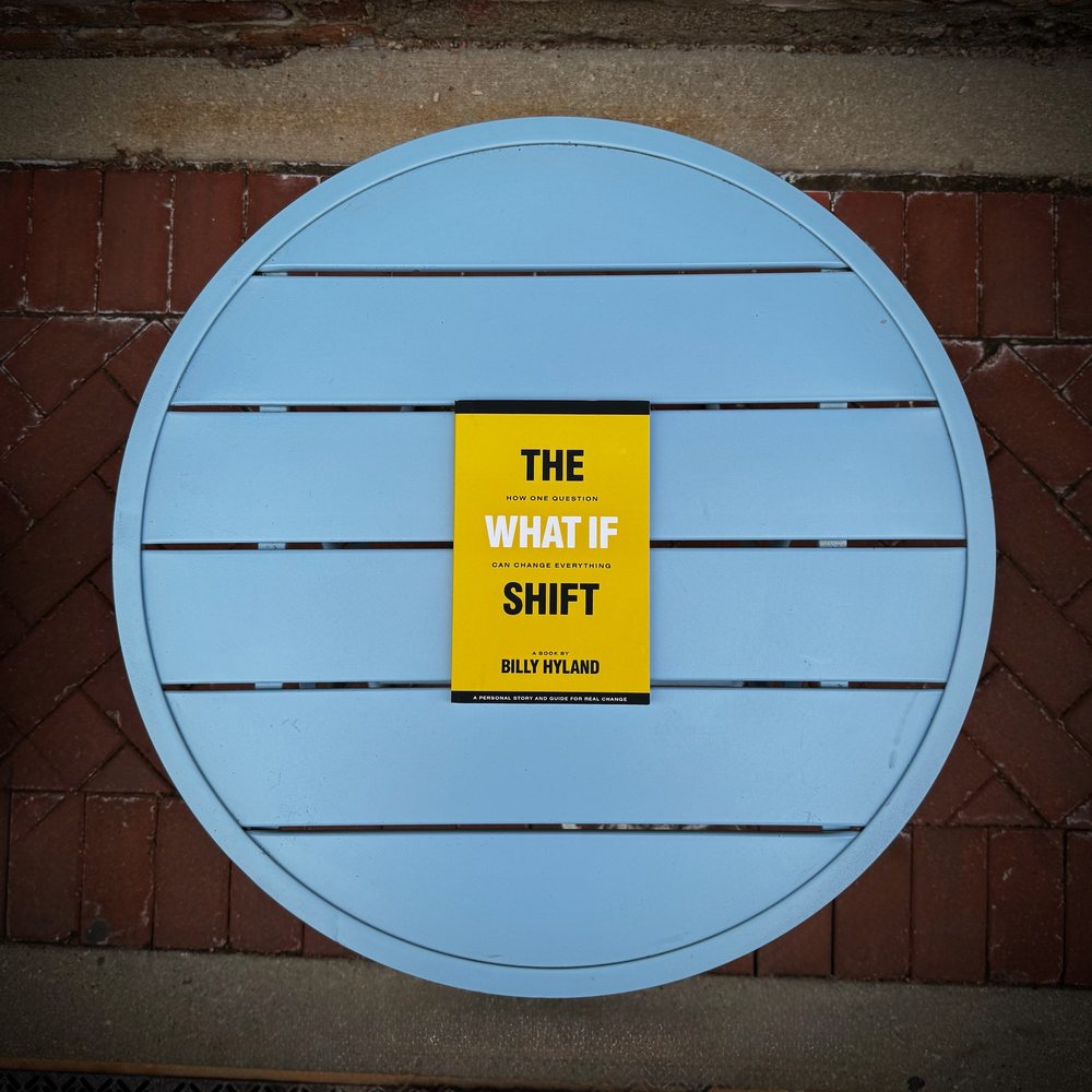 The What If Shift book cover resting on a table